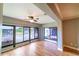 Bright sunroom with large windows showcasing scenic lake views at 10196 Seminole Island Dr, Largo, FL 33773