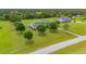 Expansive property featuring lush greenery, mature trees, and a private pool, perfect for luxurious outdoor living at 10510 Lithia Estates Dr, Lithia, FL 33547