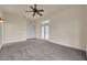 Spacious bedroom with carpeting and a ceiling fan at 10510 Lithia Estates Dr, Lithia, FL 33547