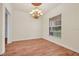 Bright dining room features wood floors, a large window, and an elegant chandelier at 10510 Lithia Estates Dr, Lithia, FL 33547