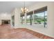 Bright dining room adjacent to the living room and screened porch with lots of natural light at 10510 Lithia Estates Dr, Lithia, FL 33547