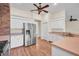 Spacious kitchen with white cabinets and stainless steel appliances at 10510 Lithia Estates Dr, Lithia, FL 33547