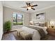 Bedroom featuring wood floors, a ceiling fan, large windows, and bedside tables with lamps at 11309 Langworth Hill Ln, Riverview, FL 33579