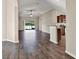 Inviting living space showcasing a seamless transition to the kitchen and offering serene views of the outdoors at 11309 Langworth Hill Ln, Riverview, FL 33579