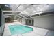 Relaxing screened in pool with an expansive deck and a white frame at 11403 Wellman Dr, Riverview, FL 33578