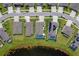An aerial view of several homes with pools backing up to a large pond at 11714 Tetrafin Dr, Riverview, FL 33579