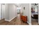 Inviting hallway with modern tile flooring and decorative accents at 11714 Tetrafin Dr, Riverview, FL 33579