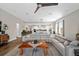 Spacious open-concept living room, seamlessly connected to the kitchen and dining area, perfect for entertaining at 11714 Tetrafin Dr, Riverview, FL 33579