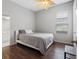 Bedroom featuring a leaf-styled ceiling fan and hardwood floors at 12439 Bristol Commons Cir, Tampa, FL 33626