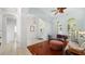 Spacious living room with beautiful hardwood floors, arched entryway and abundant natural light at 12439 Bristol Commons Cir, Tampa, FL 33626