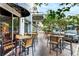 Outdoor patio area with tables and chairs at the Irish 31 Pub House & Eatery at 12439 Bristol Commons Cir, Tampa, FL 33626