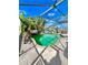 Relaxing screened-in pool area featuring lush tropical foliage and a serene view of the water at 12603 Midpointe, Riverview, FL 33578