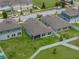 Aerial view of the home showing the backyard, patio, and surrounding neighborhood at 13105 Fruitville Way, Riverview, FL 33579