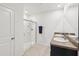 Bathroom featuring a double sink vanity and glass-enclosed shower at 15825 Mauvewood Ave, Odessa, FL 33556