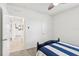Bedroom featuring carpet flooring and a view of the hallway leading to other rooms at 15825 Mauvewood Ave, Odessa, FL 33556