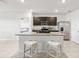 Stylish kitchen with granite countertops, stainless steel appliances, and counter seating at 15825 Mauvewood Ave, Odessa, FL 33556