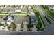 Aerial view of a residential neighborhood with tidy landscaping, well-maintained homes, and easy access to local amenities at 17156 Yellow Pine St, Wimauma, FL 33598