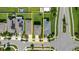 Overhead shot highlighting property lines in a suburban neighborhood with manicured lawns, and convenient street access at 17156 Yellow Pine St, Wimauma, FL 33598