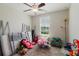 Bedroom showcasing natural light, window and bunk beds laying on ground at 17156 Yellow Pine St, Wimauma, FL 33598
