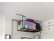 Ample overhead garage storage for organized living at 17156 Yellow Pine St, Wimauma, FL 33598