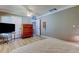Spacious bedroom with wood floors, dresser and ceiling fan at 1868 Lombardy Dr, Clearwater, FL 33755