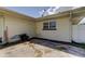 Patio with window and satellite dish at 1868 Lombardy Dr, Clearwater, FL 33755