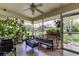 Bright and airy sunroom featuring tiled floors and lots of natural light at 1868 Lombardy Dr, Clearwater, FL 33755