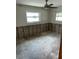 Basement with exposed concrete walls and floor, offering a blank canvas for customization and renovation at 1882 Maryland Ne Ave, St Petersburg, FL 33703