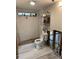 Bathroom with exposed framework and partially finished shower. There is a toilet and a shelf at 1882 Maryland Ne Ave, St Petersburg, FL 33703