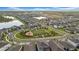 Aerial view featuring a community park in the middle of the residences, with pond views at 19272 Blue Pond Dr, Lutz, FL 33558