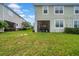 Expansive backyard with screened patio, offering a relaxing outdoor space at 19272 Blue Pond Dr, Lutz, FL 33558