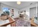 Bright Bedroom features a crib, natural light, and decorative touches, creating a sweet and playful environment at 19272 Blue Pond Dr, Lutz, FL 33558