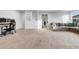 Spacious living room area features carpeted floor, neutral walls, and built in shelving at 19272 Blue Pond Dr, Lutz, FL 33558