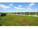 Picturesque pond view from the backyard, providing a serene and peaceful atmosphere at 19272 Blue Pond Dr, Lutz, FL 33558