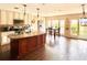Bright, open kitchen boasting an island, modern appliances, and lots of natural light at 2014 Nancy Ave, Lutz, FL 33548