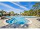 Community pool featuring stairs for entry and resort-style lounge seating at 20244 Merry Oak Ave, Tampa, FL 33647