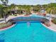 Aerial view of the community pool, lounge seating, and water park at 20244 Merry Oak Ave, Tampa, FL 33647