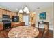 Kitchen view with dining area, stainless steel appliances and wooden accents at 20244 Merry Oak Ave, Tampa, FL 33647