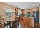 Spacious kitchen featuring a center island, stainless steel appliances, and wood flooring at 20244 Merry Oak Ave, Tampa, FL 33647
