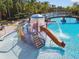 Community water park featuring a slide and splash pad perfect for entertaining on a sunny day at 20244 Merry Oak Ave, Tampa, FL 33647