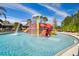 Community water park featuring a zero entry pool, slides, and splash pad at 20244 Merry Oak Ave, Tampa, FL 33647