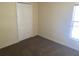 Simple bedroom featuring neutral carpet, a closet, and a window at 205 Summer Sails Dr, Valrico, FL 33594