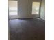 Bright, spacious bedroom featuring two large windows at 205 Summer Sails Dr, Valrico, FL 33594