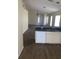 Kitchen area featuring a breakfast bar, dishwasher, and seamless connection to the living area at 205 Summer Sails Dr, Valrico, FL 33594