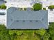Birds eye view of the roof of the multi-unit residential complex and associated parking at 2066 Sun Down Dr, Clearwater, FL 33763