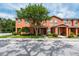 Charming townhome with well-maintained lawn and mature trees at 2066 Sun Down Dr, Clearwater, FL 33763
