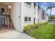 Exterior condo building entrance featuring stairs leading up to the units, showing access and design at 221 Fernwood Cir # 221, Seminole, FL 33777