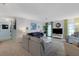 Inviting living room with plush seating, neutral colors, and ample space for relaxation and entertainment at 221 Fernwood Cir # 221, Seminole, FL 33777