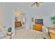 Bright office space featuring light hardwood floors, white walls, open doorway, and warm, inviting decor at 2292 Sifield Greens Way # 59, Sun City Center, FL 33573