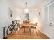 Dining room features a wooden table and chairs and hardwood floors at 2368 Flanders Way # D, Safety Harbor, FL 34695